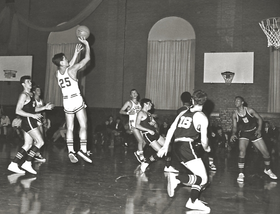 Basketball -- not the 9th grade team! -- in the Old Gym, 1968. Mike Timm '68 (#25) and Cary Jubinville '68. Photo by Paul Wainwright '68.