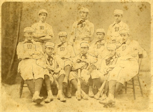 The 1876 baseball nine.  Frank Blair is seated 3rd from left; pitcher Billy Dennison is in the center, holding the baseball.