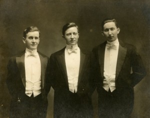 The Gamma Sigma team of 1913, dressed to the nines for the joint debate. Thomas F. Kiley '14, Timothy J. O'Brien '15, and John M. Lynch '13.