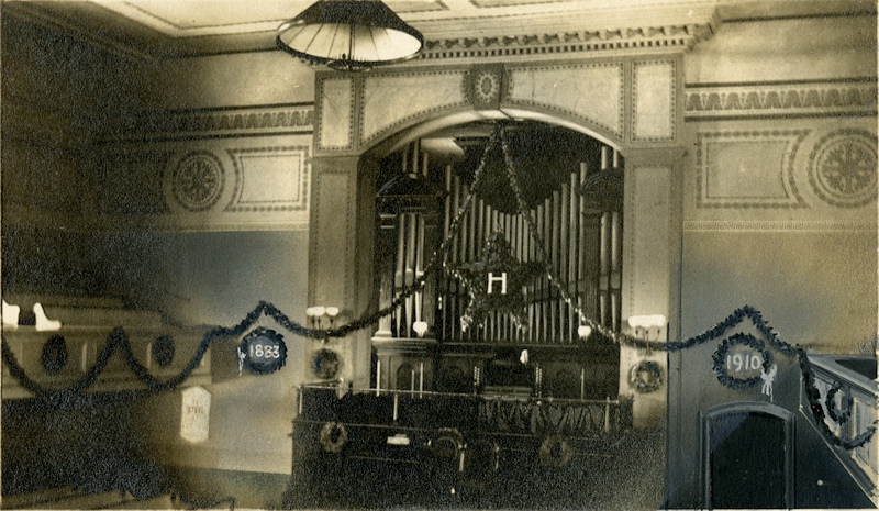 From Christmas 1910, showing considerable redecoration, including the removal of the painted design from the organ pipes. (Easthampton Congregational Church)