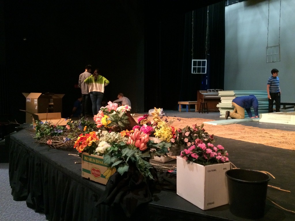 Boxes of artificial flowers that will ultimately adorn the stage. 
