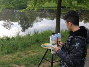 Sitai Chen painting en plein air at 6:00 AM.