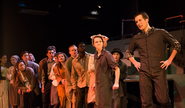 Oliver as Bobby Strong with the company of Urinetown, Spring 2014