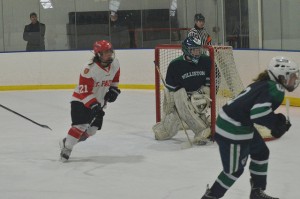 Morgan Fisher pictured in net in a girls varsity hockey game vs. St. Paul's. Photo by Jay Grant